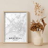 Framed Montreal and Quebec poster map print: Classic minimalism, enhanced by shades of grey and white, offers timeless elegance to any space.