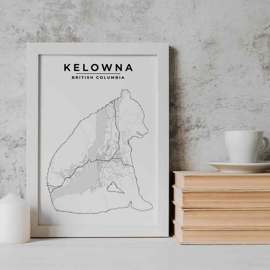 Framed Grizzly bear Map Print of Kelowna, British Columbia is shown inside a grey bear shape poster