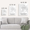 Living room with a stylish and minimalist Vancouver, BC poster map. Timeless grey and white hues add a touch of sophistication.